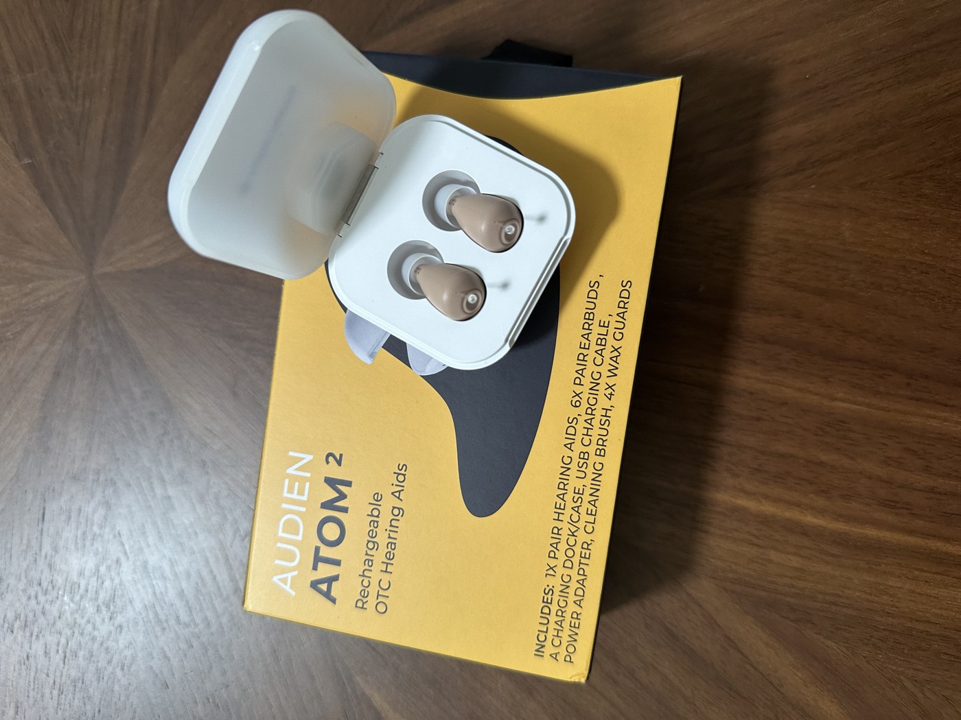 Audien Atom 2 hearing aid and charging case